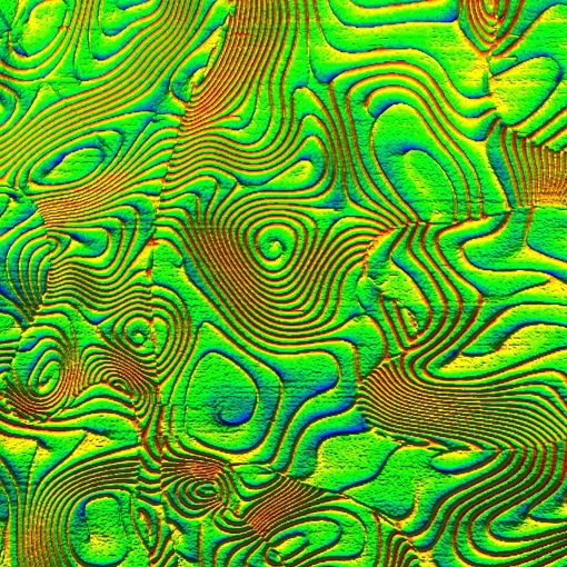 Zooming into heterochiral magnets attoMFM