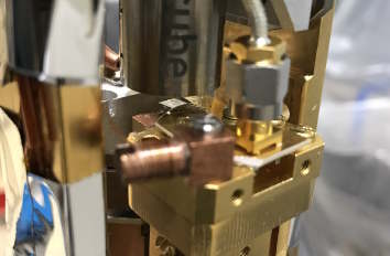 A quantum network node and register based on silicon vacancies in diamond cryogenic positioners and cryogenic objective