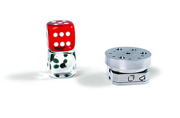 Outgassing Behaviour in Ultra High Vacuum made with Ambient or Vacuum Nanopositioner